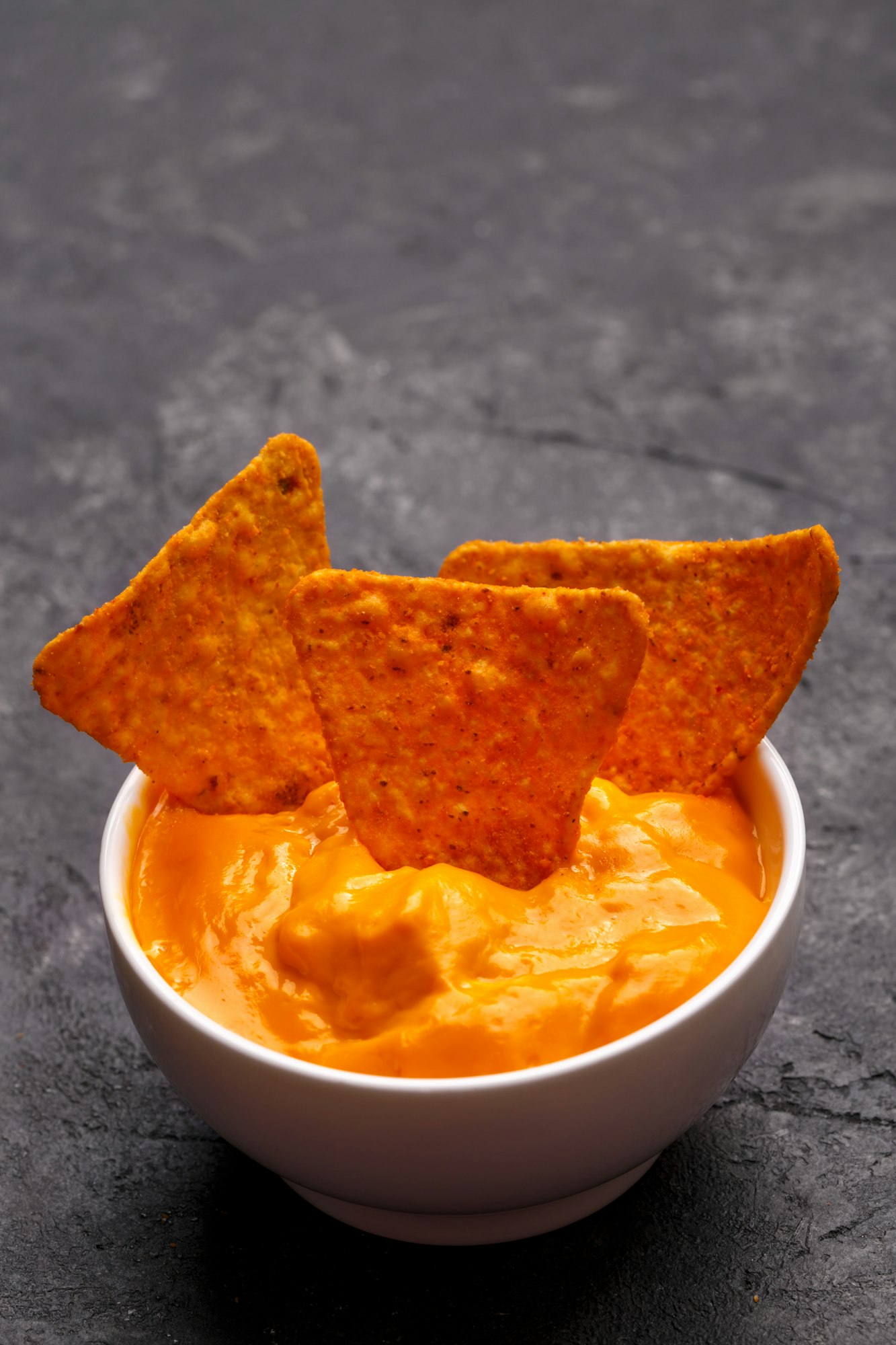 Corn chips and cheese sauce